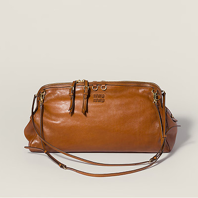 [스페셜오더]MIUMIU-5BF133 미우미우 카프리스 가죽 클러치 코냑